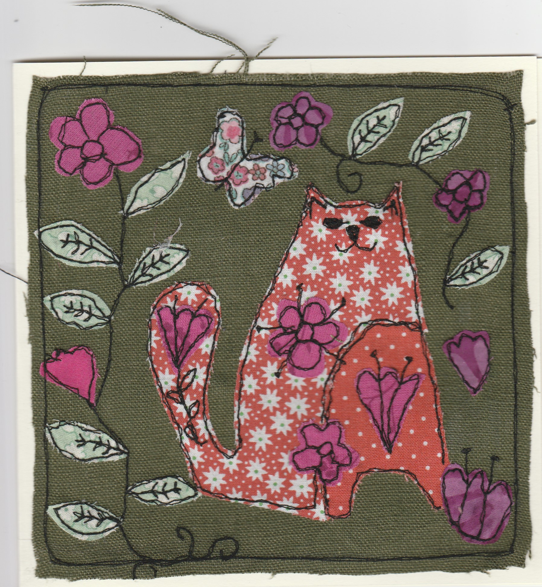 Freehand machine sewn gift card with cat surrounded by flowers