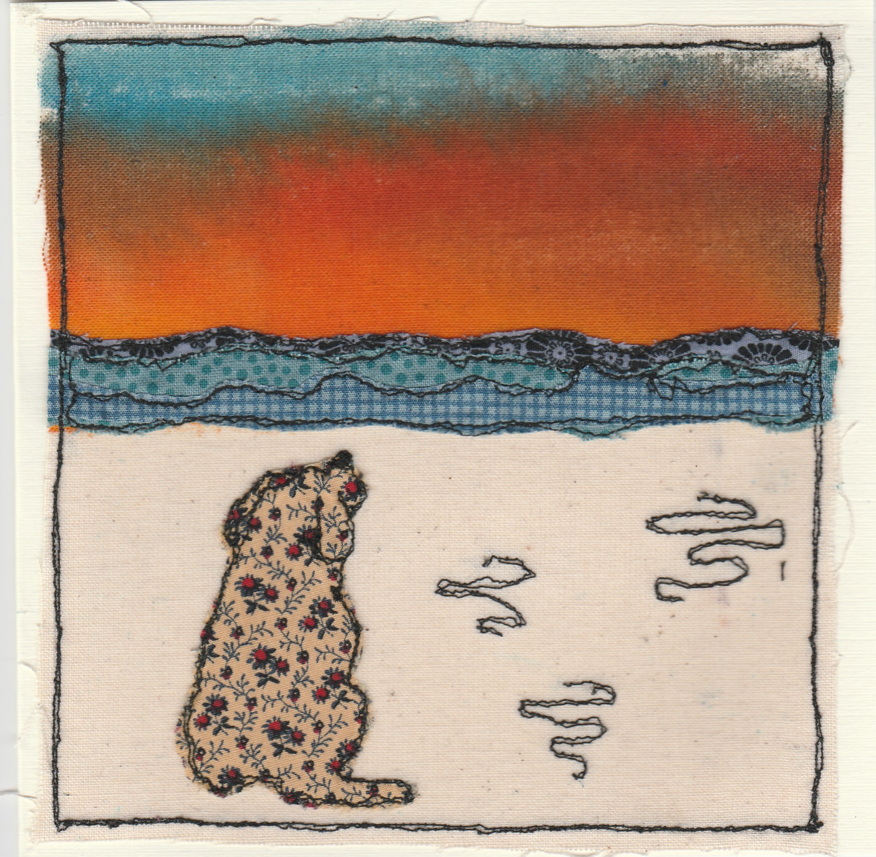 Freehand machine sewn gift card with dog on the beach at sunset