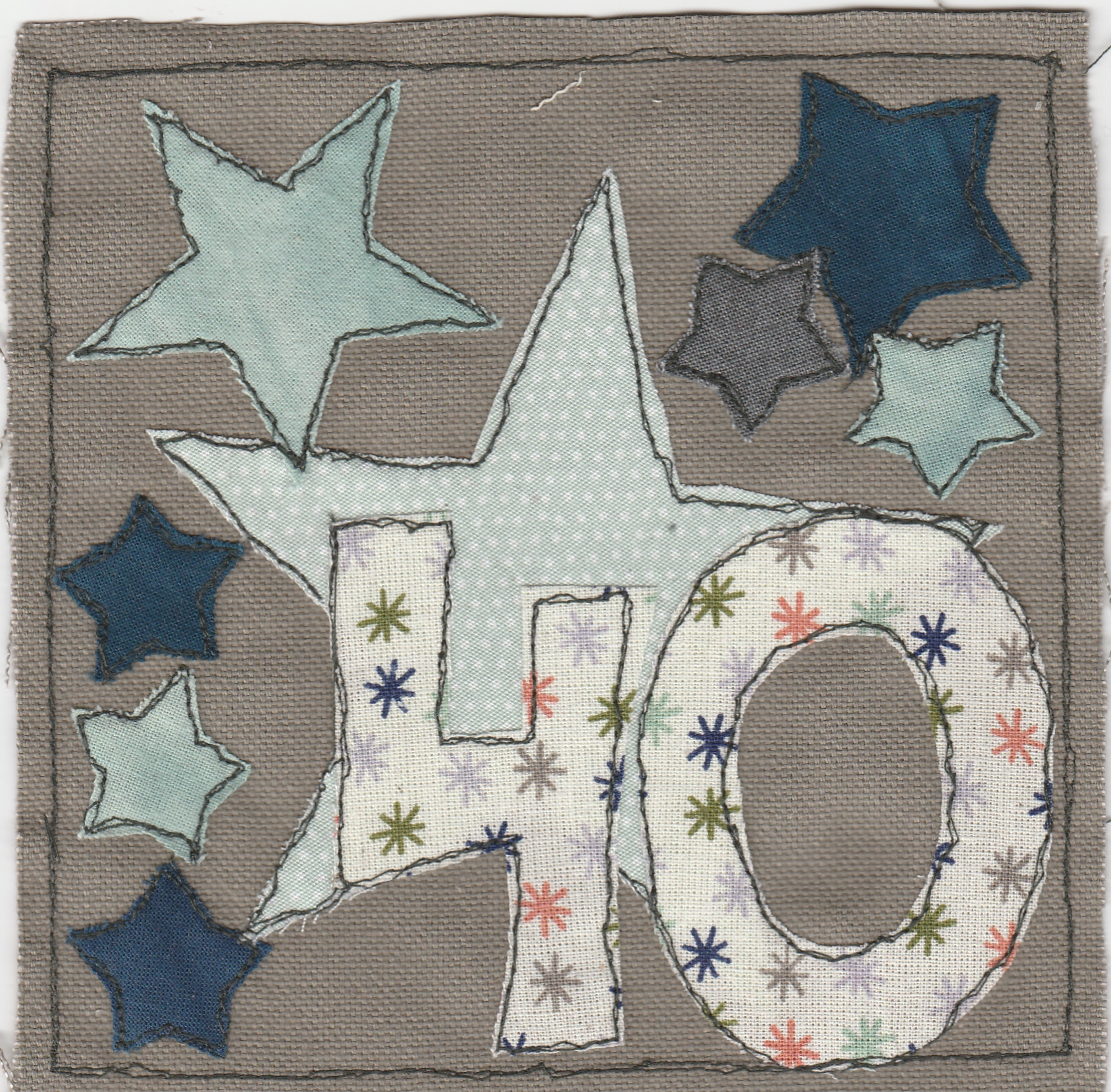 Freehand machine sewn christmas card with number forty and star background