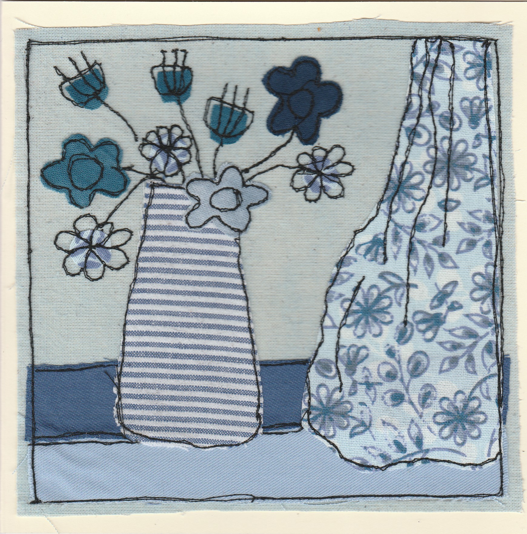 Freehand machine sewn gift card with flowers in vase by window with blue theme