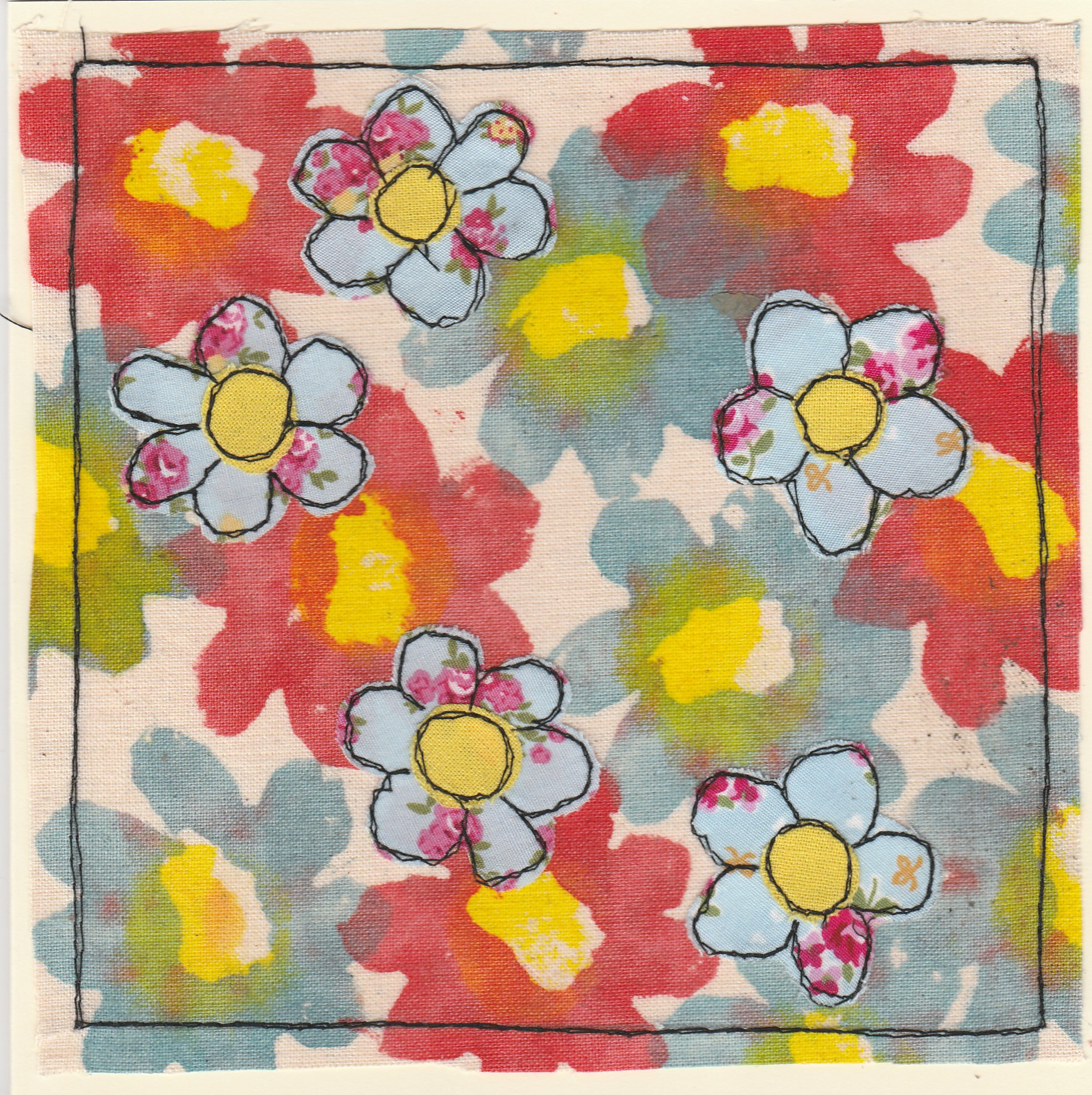 Freehand machine sewn gift card with multicolour flowers