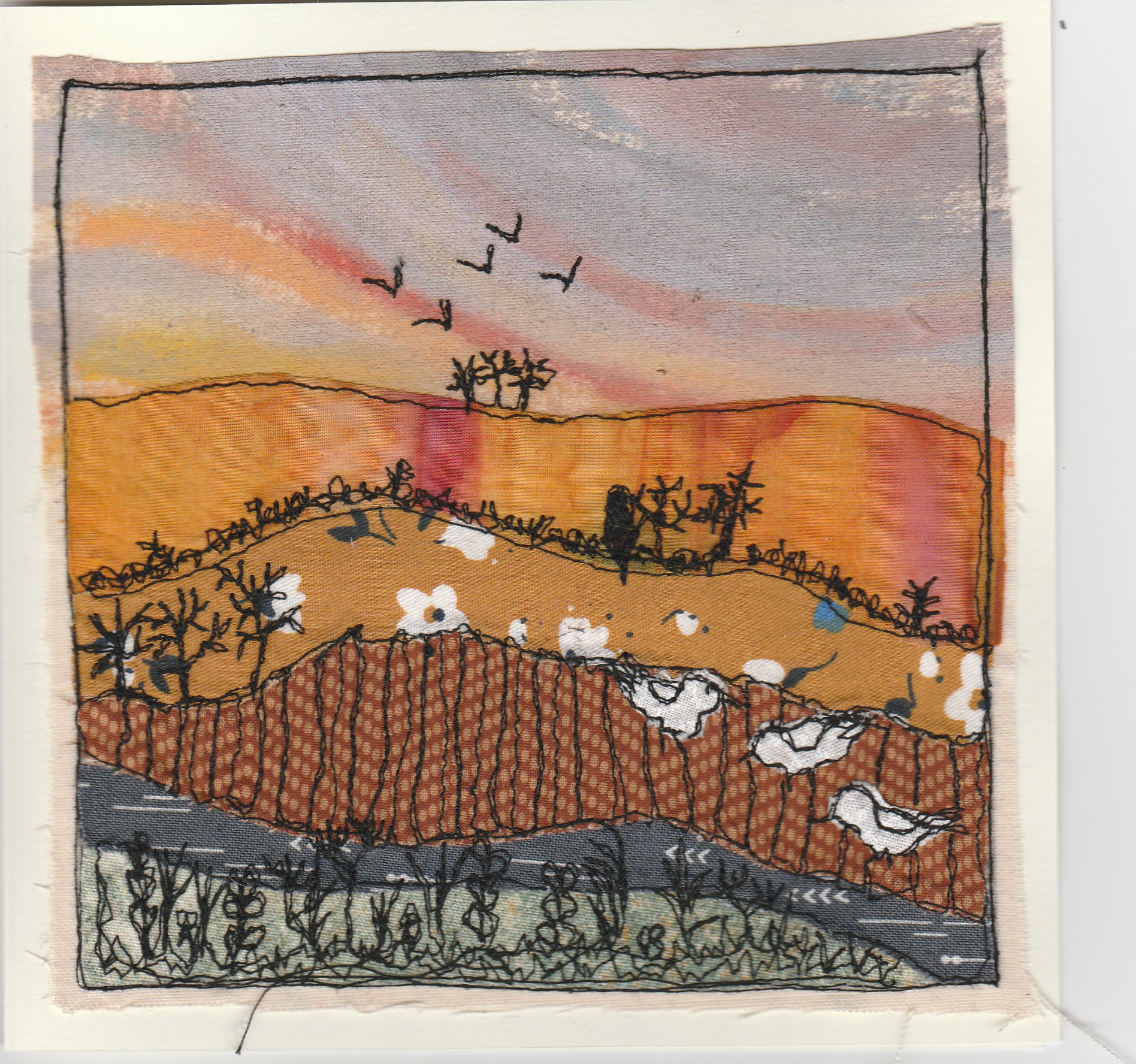 Freehand machine sewn gift card with doves in autumnal field